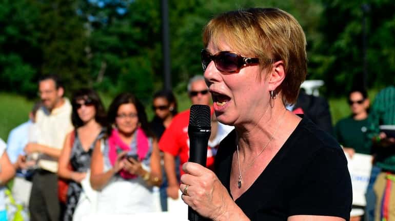 Carol Burris speaks during a rally against common Core in...