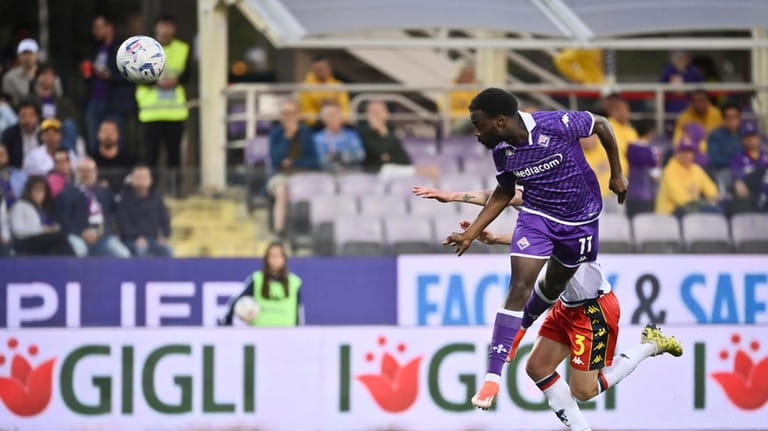 Fiorentina's Jonathan Ikone scores his side's opening goal during the...