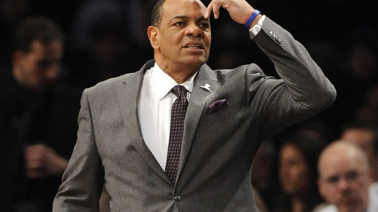 Brooklyn Nets coach Lionel Hollins reacts during the first half...