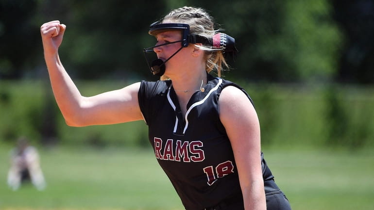 Emily Brown of Clarke celebrates an out in the fifth inning...