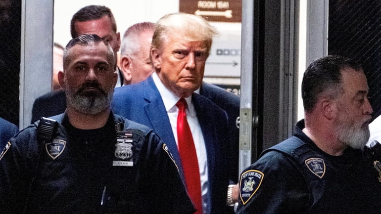 Former President Donald J. Trump enters the Manhattan courtroom Tuesday for...