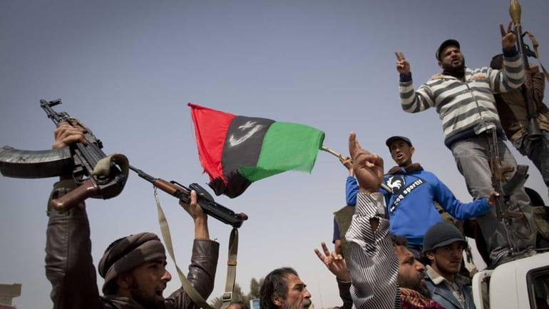 Libyan rebels regained control of the eastern gateway city of...