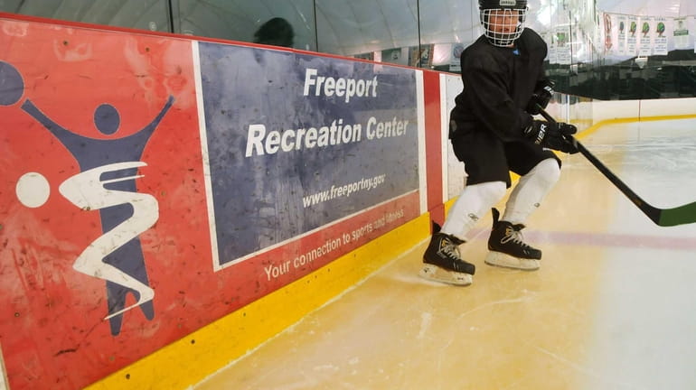 Ice Hockey player Joseph LaChase, 12, of Howard Beach, practices...