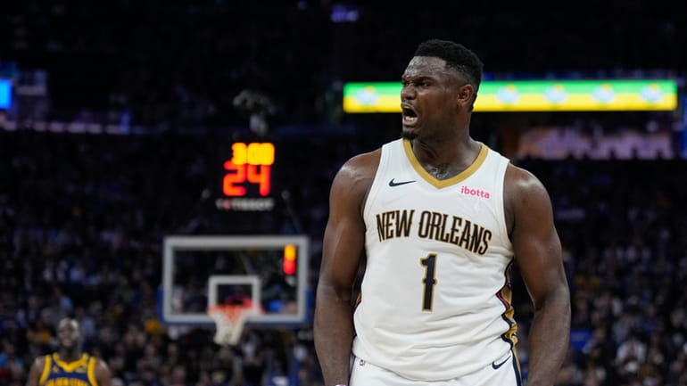 New Orleans Pelicans forward Zion Williamson reacts during the first...
