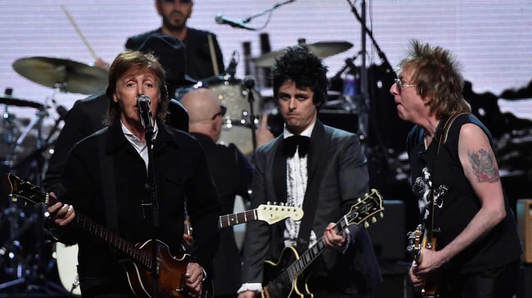 Inductees Ringo Starr and Billie Joe Armstrong of Green Day...