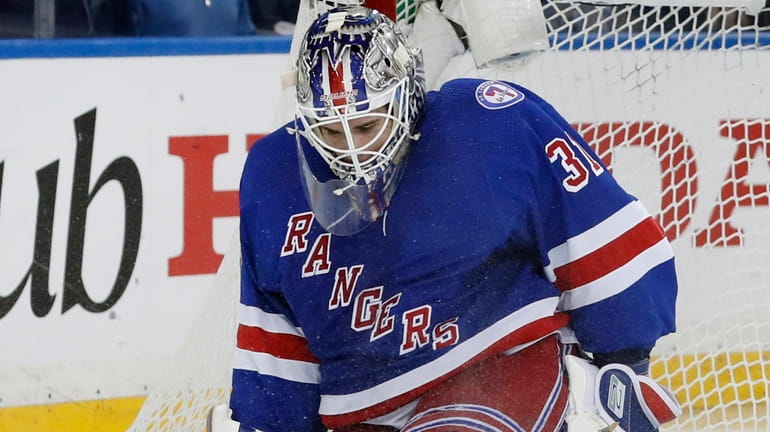 Igor Shesterkin of the Rangers makes a save in the second period...