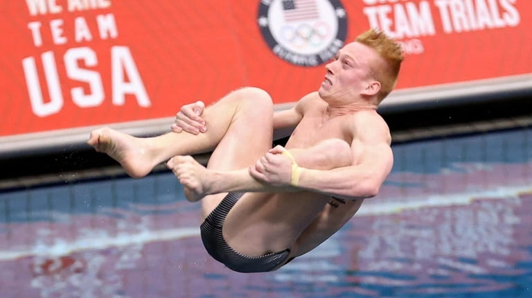 Andrew Capobianco competes in the men's 3-meter springboard final during...