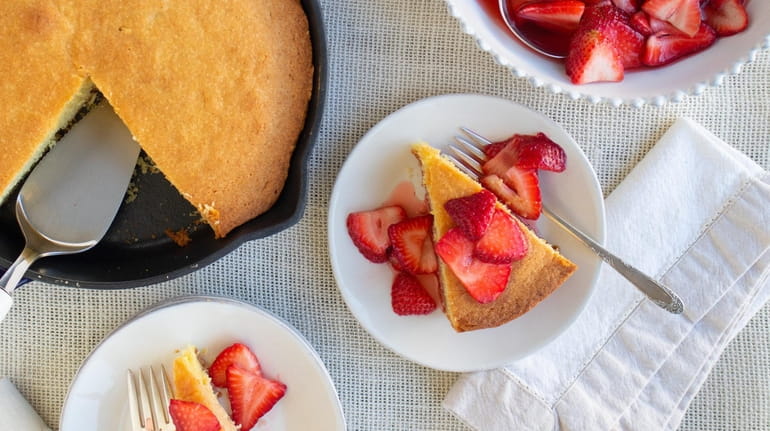 Cornmeal poundcake is baked in a skillet and served topped...