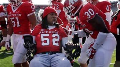 Former Rutgers football player and senior Eric LeGrand (52), who...