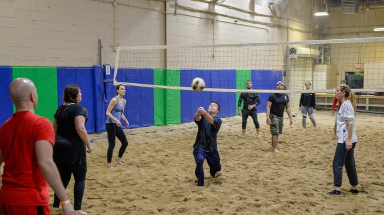 People play beach volleyball indoors at the year-round venue Endless...