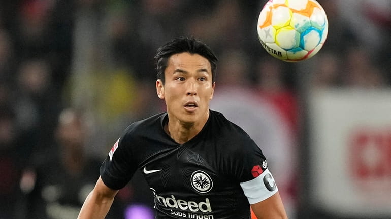 FILE - Frankfurt's Makoto Hasebe plays during the German Bundesliga...