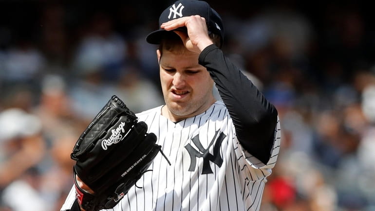Jordan Montgomery of the Yankees reacts during the fifth inning against...