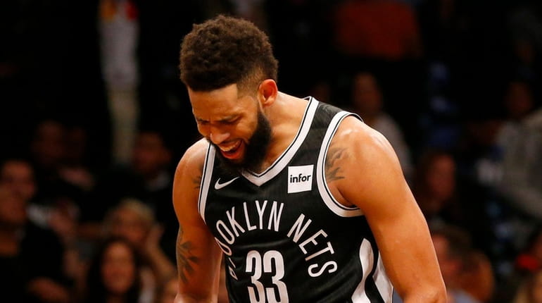 Allen Crabbe #33 of the Brooklyn Nets reacts during the...