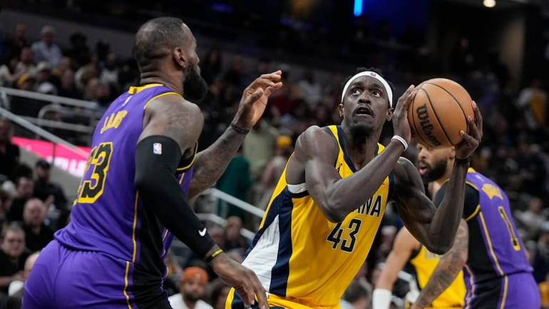 Indiana Pacers' Pascal Siakam (43) shoots against Los Angeles Lakers'...