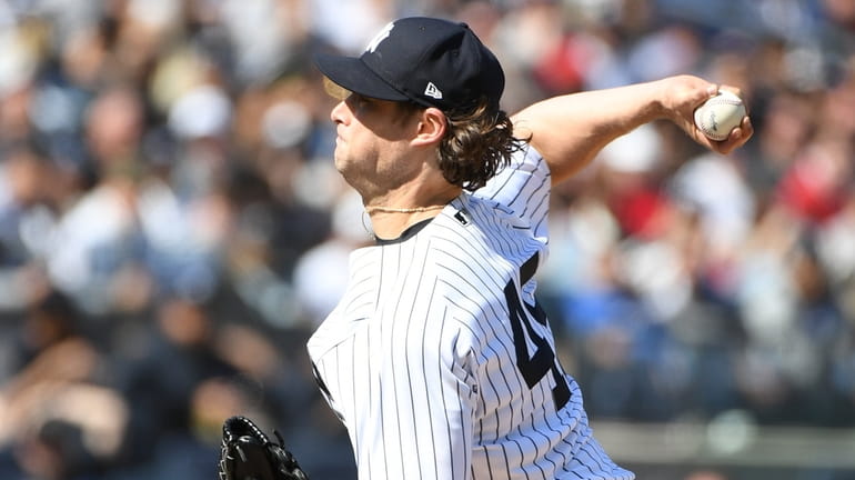 Yankees starting pitcher Gerrit Cole delivers against the Guardians during...