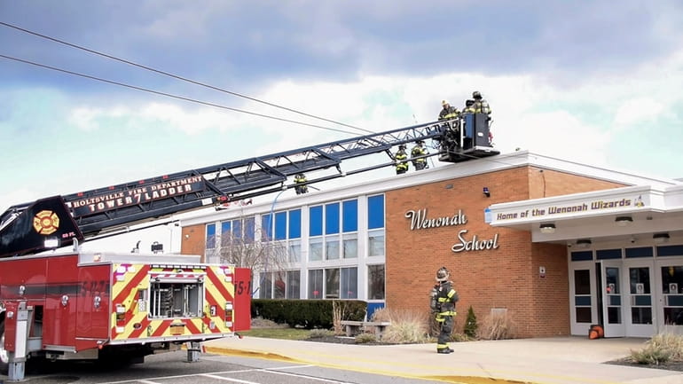 Firefighters responded to a fire at Wenonah Elementary School on...