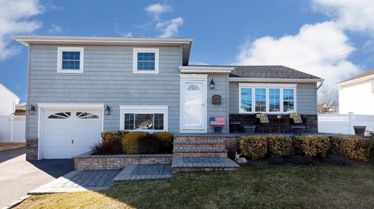 Listed for $609,990, this three-bedroom, 2½-bathroom split-level home has undergone a...