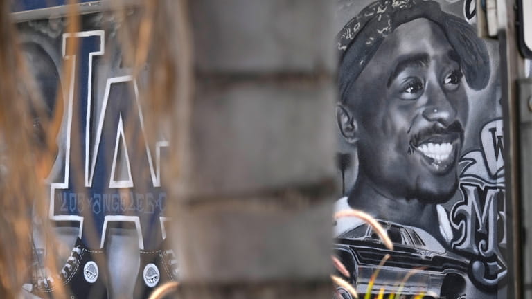 A portion of a mural by artist sloe_motions depicting Tupac...