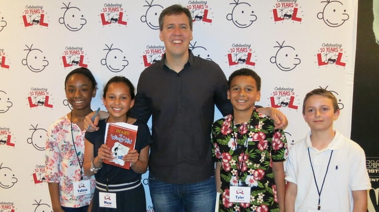 Author Jeff Kinney with Kidsday reporters from Bay Shore at...