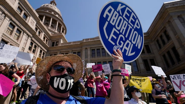 Abortion rights demonstrators attend a rally at the Texas state...