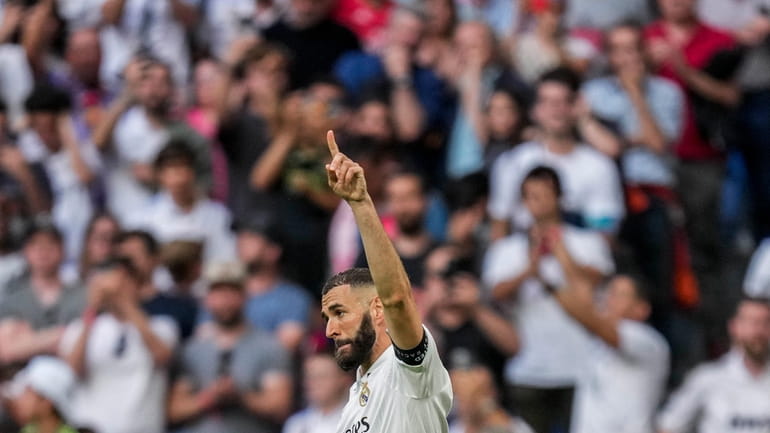 Real Madrid's Karim Benzema celebrates after scoring during the Spanish...