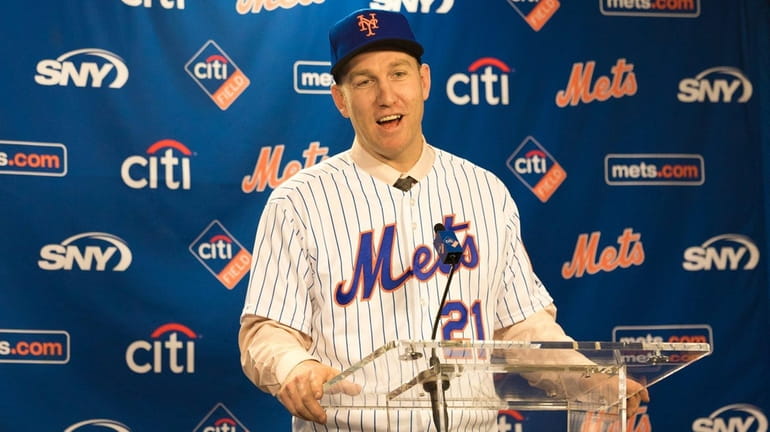 The Mets' Todd Frazier talks to reporters during his introductory...