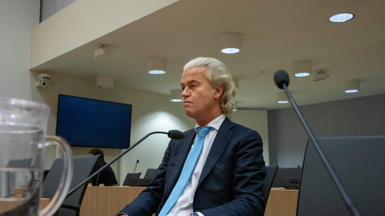 Firebrand anti-Islam lawmaker Geert Wilders listened as the court delived...