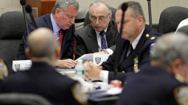 New York City Mayor Bill de Blasio, left, and NYPD...