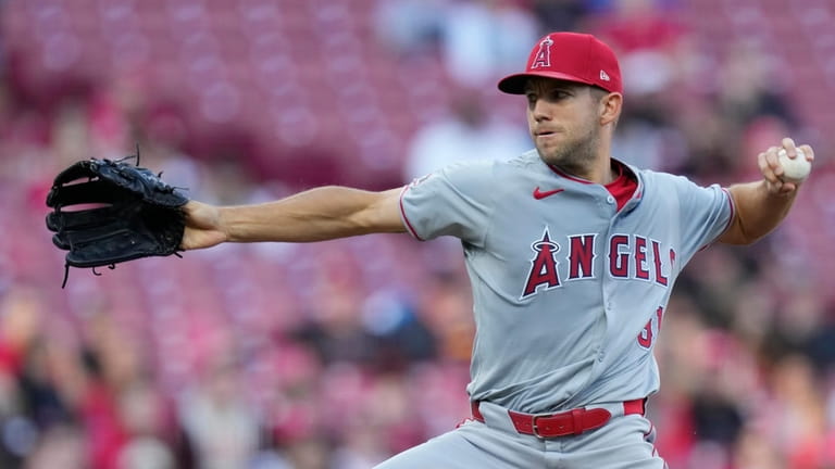 Los Angeles Angels pitcher Tyler Anderson throws in the first...