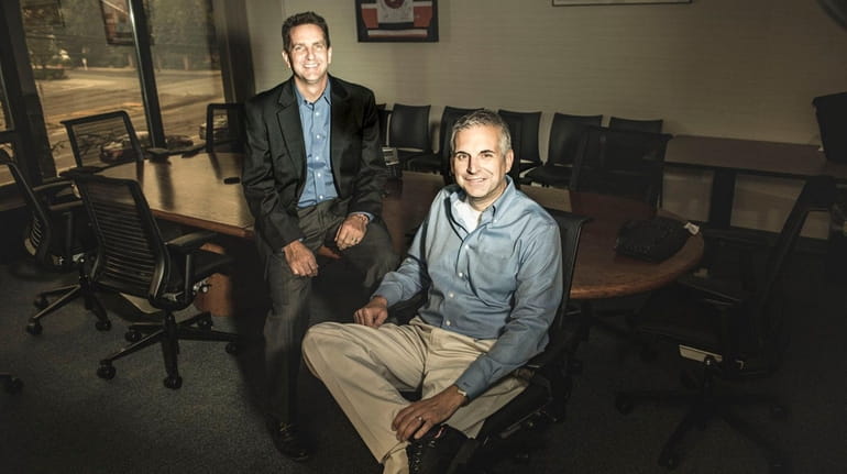 LBI Software president Richard Teed, right, and vice president Gary...