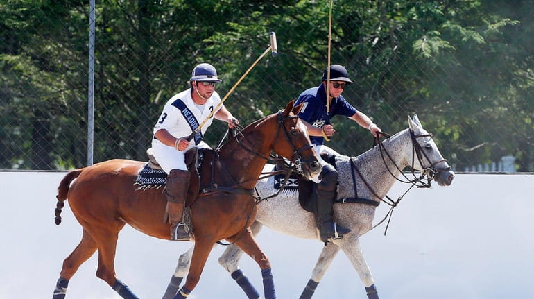 Polo players Rob Ceparano, left, of Medford and Aaron Pagel,...