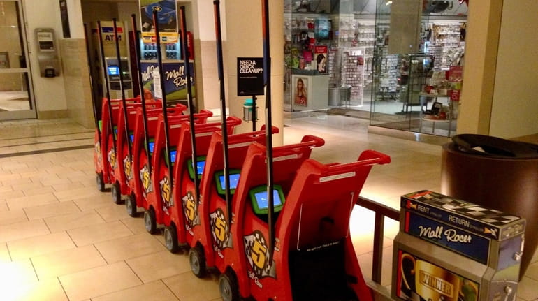 Racecar-themed Smarte Wheels Tablet Strollers can be rented at the Westfield...