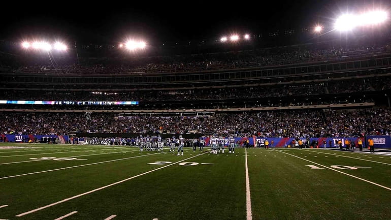 The Dallas Cowboys and the New York Giants wait on...