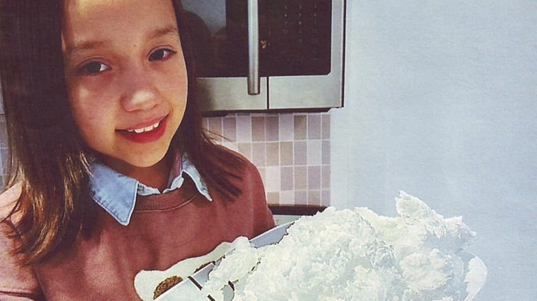 Kidsday reporter Kiara Anderson with her homemade snow.