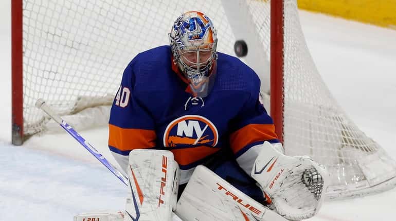 Semyon Varlamov #40 of the New York Islanders makes a...