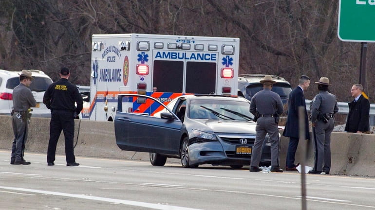 New York State Police investigate an accident in which a...