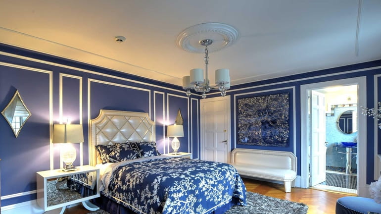 The Rhapsody in Blue bedroom designed by New York-based Jeani...
