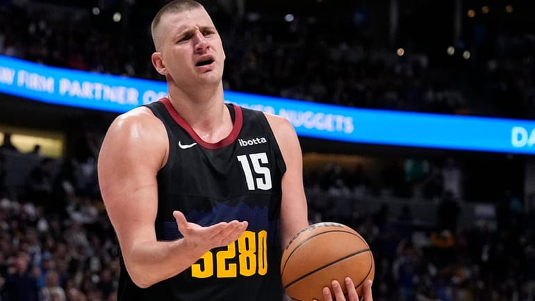 Denver Nuggets center Nikola Jokic reacts after a call during...