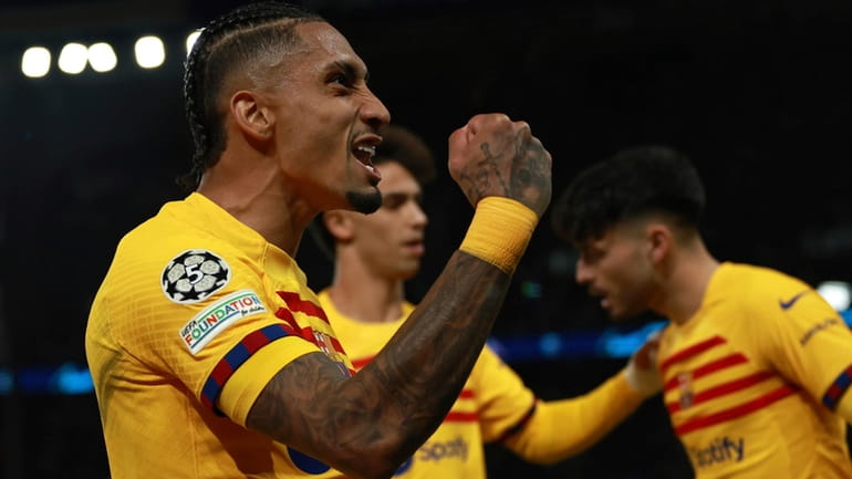 Barcelona's Raphinha celebrates scoring his side's second goal during the...