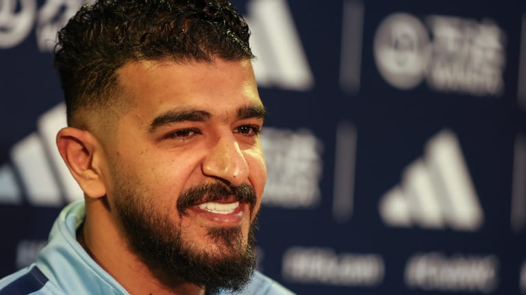 Al Hilal SFC goalkeeper Abdullah Al-Mayouf attends a press conference...