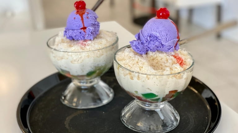Halo halo, a popular Filipino cold dessert, is topped with...