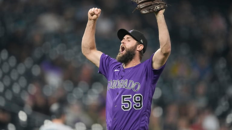 Colorado Rockies relief pitcher Jake Bird reacts after striking out ...