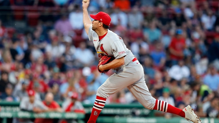 St. Louis Cardinals' Adam Wainwright pitches against the Boston Red...