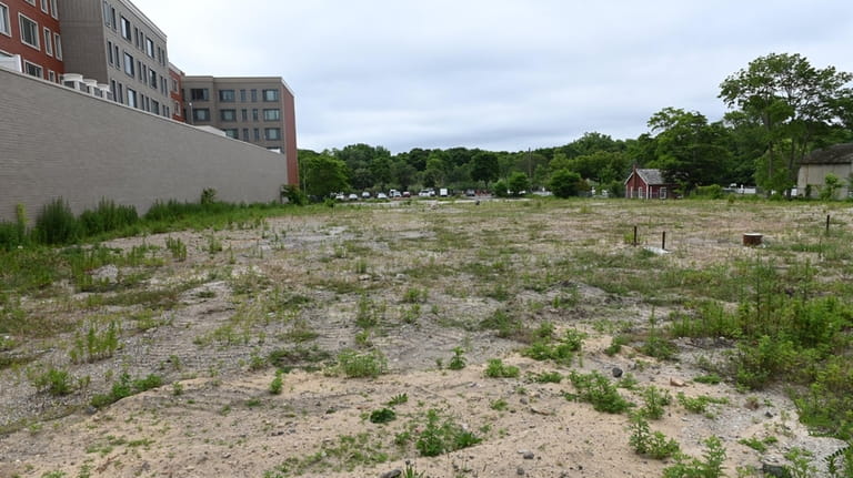 A developer plans to build a five-story apartment complex on a vacant lot...
