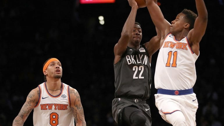 Caris LeVert of the Nets takes a shot at the...
