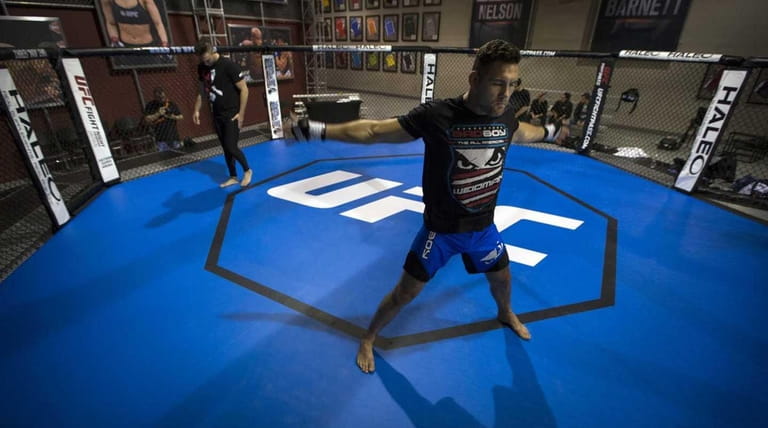 Chris Weidman loosens up before a workout at the TUF...