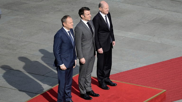 German Chancellor Olaf Scholz, French President Emmanuel Macron and Poland's...