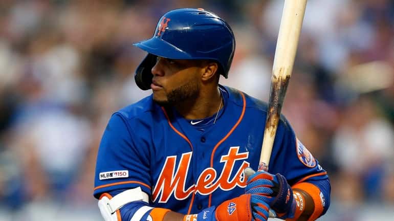 Robinson Cano of the Mets bats during the first inning against the...