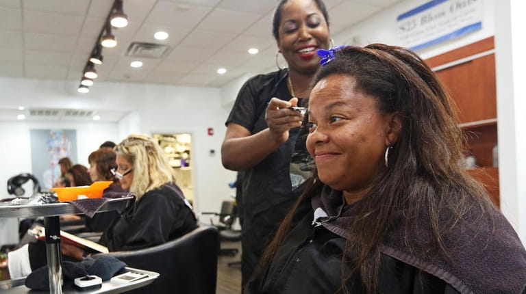 Tiffany Jackson of Freeport gets a new look from hairstylist Sam Samuels...