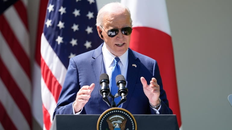 President Joe Biden speaks during a news conference with Japanese...